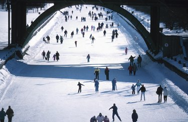People ice skating outdoors, Ottawa, Canada