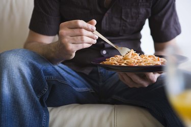 Man eating pasta