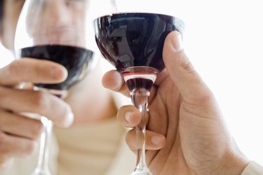 People toasting glasses of wine