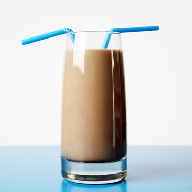 Glass of Chocolate Milk with Two Straws