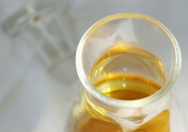 High angle view of oil in a jar