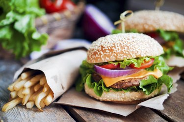 Closeup of home made burgers on wooden background