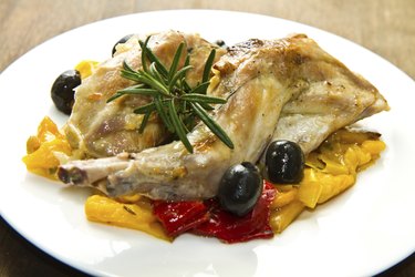 Baked rabbit with olives and pepper