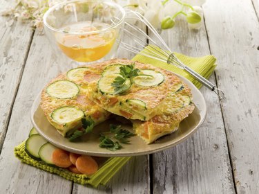 omelette with carrot zucchinis and parsley