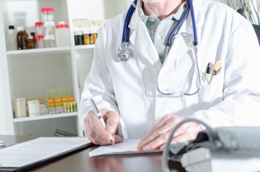 Doctor writing a prescription