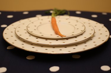 Food: empty plate setting with carrot