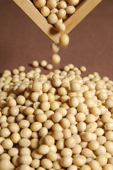 Soybeans poured from a container