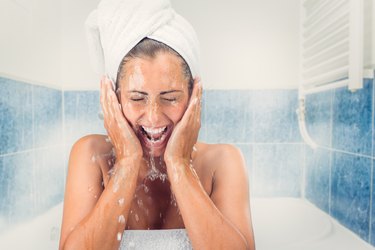 Young Woman Washing The Face