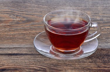 Cup of tea on wooden background