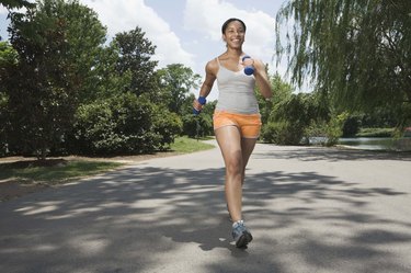 Woman running in street