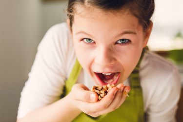 Funny Girl eating walnuts