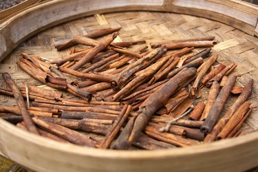 Cinnamon sticks in a basket closeup