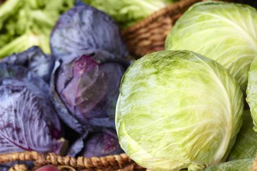 Purple And Ordinary Cabbages On Sale At the Market