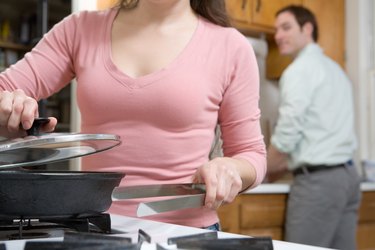 Couple making dinner together