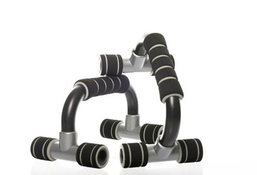 push-up bars with reflection in a studio