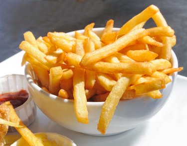 Golden French fries potatoes ready to be eaten