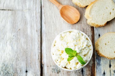 homemade ricotta with bread decorated with mint