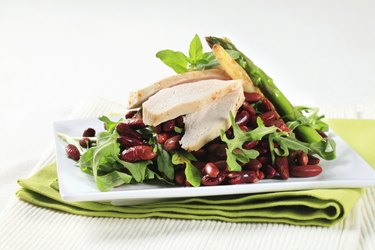 Chicken breast with red beans and arugula