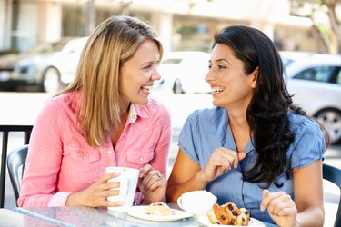 Women chatting over coffee and cakes