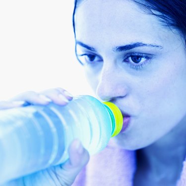 close-up of a woman drinking water