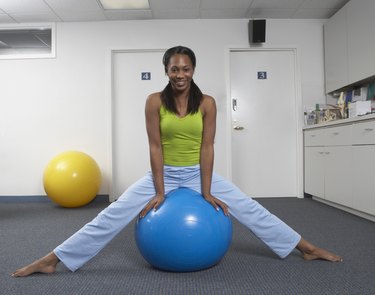 Woman exercising with a fitness ball