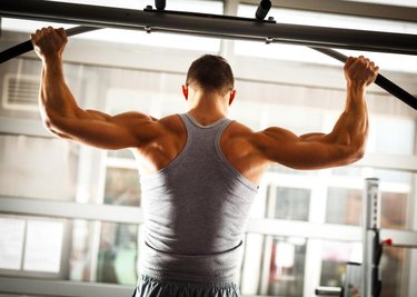 Man working his back at the fitness club.