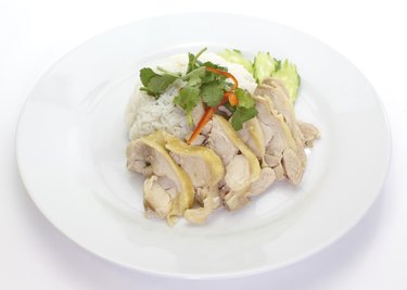 hainanese food chicken steamed rice and vegetables