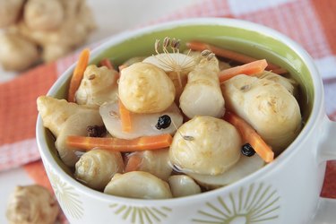 Marinated Jerusalem artichokes in bowl