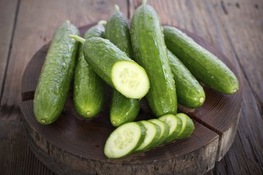 Fresh cucumber on the wooden table