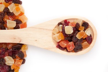 Wooden spoon with dried fruit