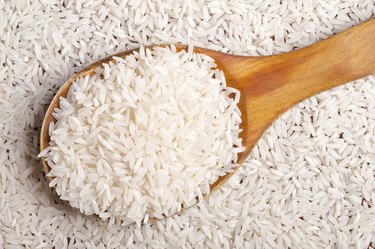 Rice background with spoon.