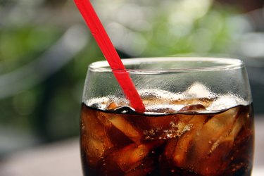Soda with Ice Cube and Drinking Straw