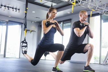 Couple working out with weights