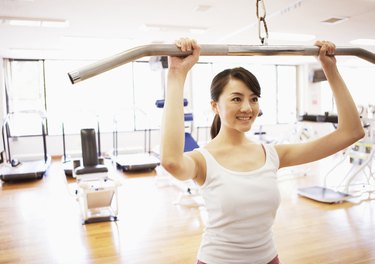 Young woman exercising in a gym