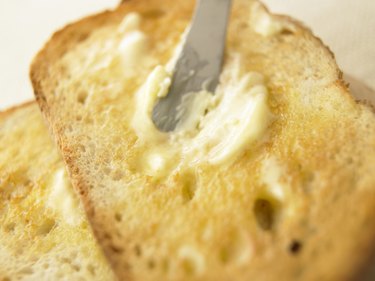 Slices of toast with butter, close up