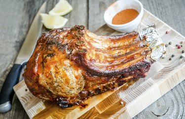 Grilled pork ribs on a wooden cutting board