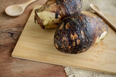 taro root on old wooden table