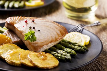 Grilled tuna steak served on asparagus with roasted zmieniakami