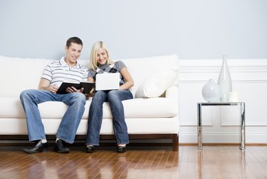 Happy Couple Relaxing on Couch