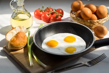 Scrambled Eggs on a Pan and Ingredients