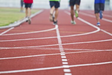 Cropped image of  runner on competitive running