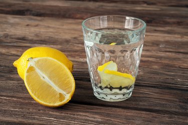 glass of water with lemon slices