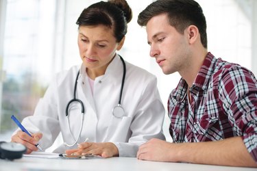 doctor with male patient
