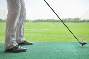 Man getting ready to hit a golf ball