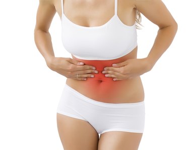 Woman having pain in stomach