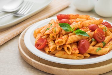 Penne pasta in tomato sauce on plate