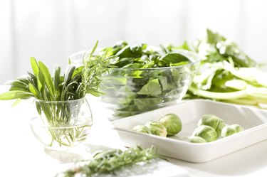 Assortment of green vegetables on a kitchen counter