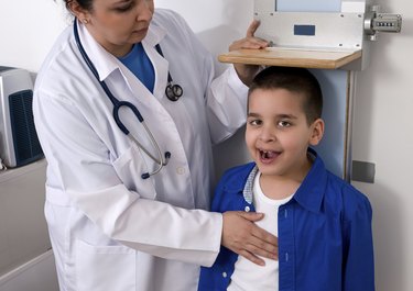 Doctor Measuring Height