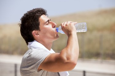 Athlete drinking water