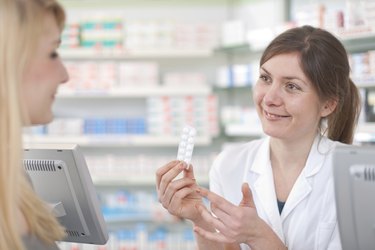 Pharmacist With Customer